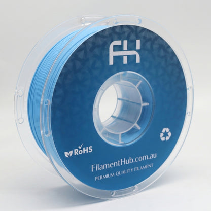 Lake blue PETG Pro 1.75mm 3D printer filament spool by FilamentHub with a glossy finish, ideal for durable functional prints, mechanical parts, and high-strength everyday 3D printing.