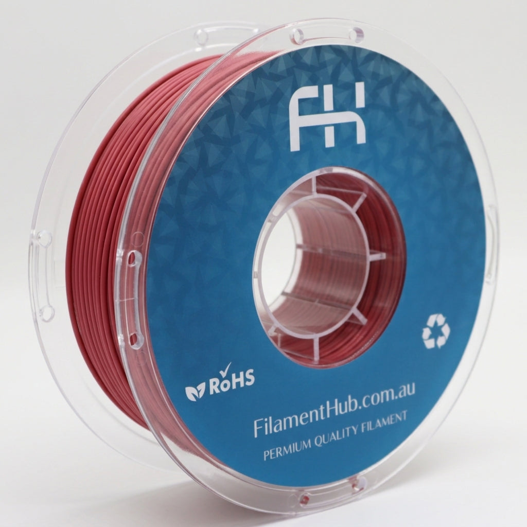 Matte blood red PLA 1.75mm 3D printer filament spool by FilamentHub with a smooth matte finish, ideal for detailed prints, prototypes, cosplay, and everyday 3D printing projects.