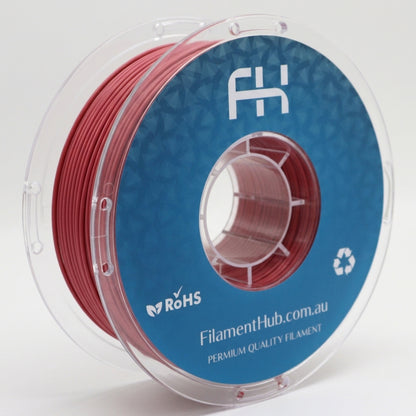 Matte blood red PLA 1.75mm 3D printer filament spool by FilamentHub with a smooth matte finish, ideal for detailed prints, prototypes, cosplay, and everyday 3D printing projects.