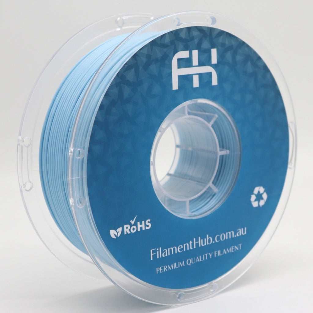 Matte pastel blue PLA 1.75mm 3D printer filament spool by FilamentHub with a smooth matte finish, ideal for detailed prints, decorative models, prototypes, and everyday 3D printing projects.