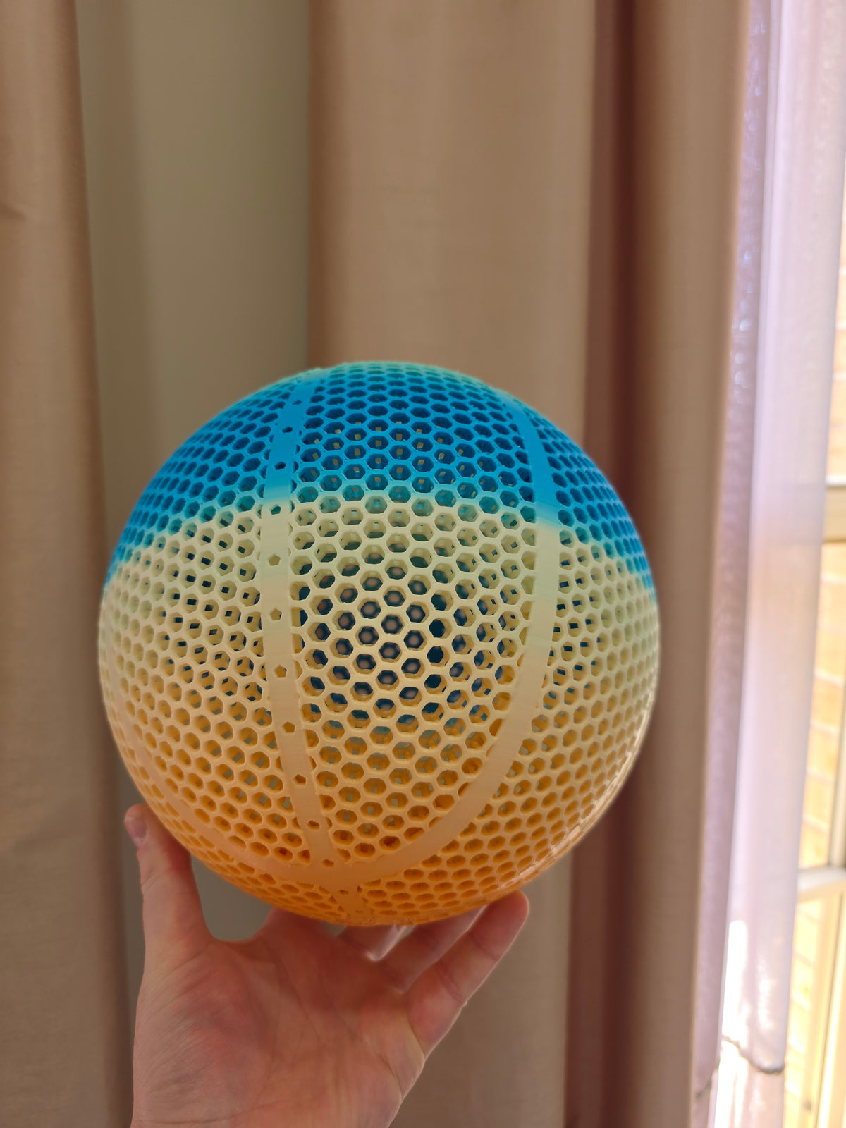orange white blue airless basketball, 3D printed in FPLA Rainbow - Blue / Orange / White